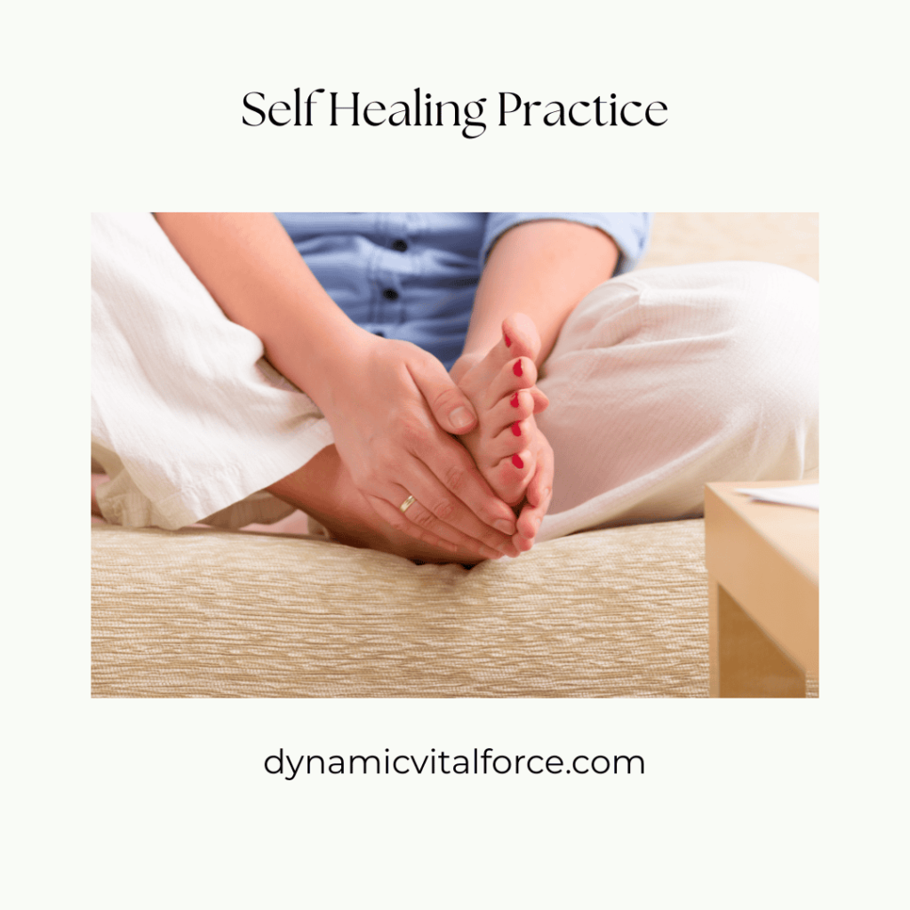Woman healing her root chakra in feet